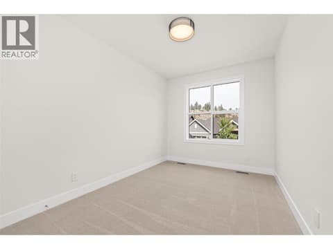 Bedroom #2 | Upper Level at 1448 Whistling Pine Place, Wilden, Kelowna