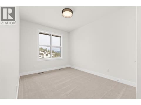 Bedroom #3 | Upper Level at 1448 Whistling Pine Place, Wilden, Kelowna