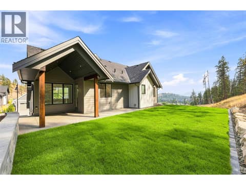 Covered Patio & Backyard Space | Upper Level - Roughed in for a hot tub at 1448 Whistling Pine Place, Wilden, Kelowna