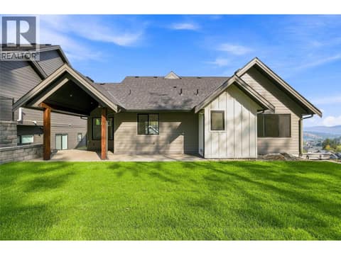 Covered Patio & Backyard Space | Upper Level - Roughed in for a hot tub at 1448 Whistling Pine Place, Wilden, Kelowna