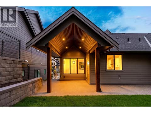 Covered Patio & Backyard Space | Upper Level - Roughed in for a hot tub at 1448 Whistling Pine Place, Wilden, Kelowna
