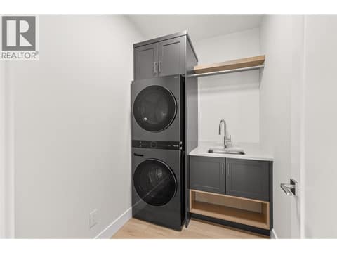 Laundry Room | Upper Level at 1448 Whistling Pine Place, Wilden, Kelowna