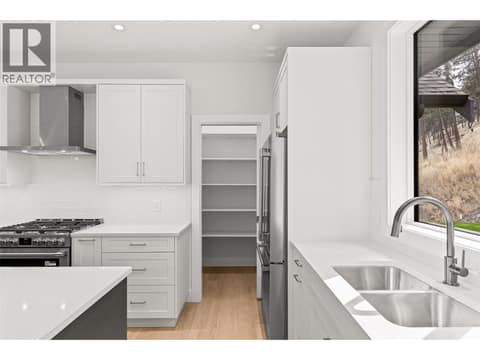 Pantry | Upper Level at 1448 Whistling Pine Place, Wilden, Kelowna