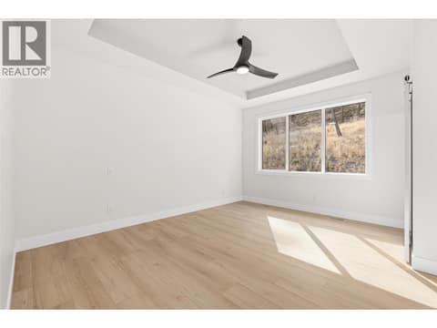 Primary Bedroom | Upper Level - Bedroom #1 - with 4 piece ensuite & walk-in closet at 1448 Whistling Pine Place, Wilden, Kelowna