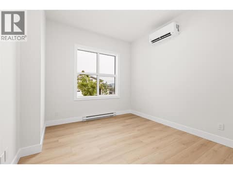 Suite Bedroom | Lower Level - Bedroom #5 at 1448 Whistling Pine Place, Wilden, Kelowna