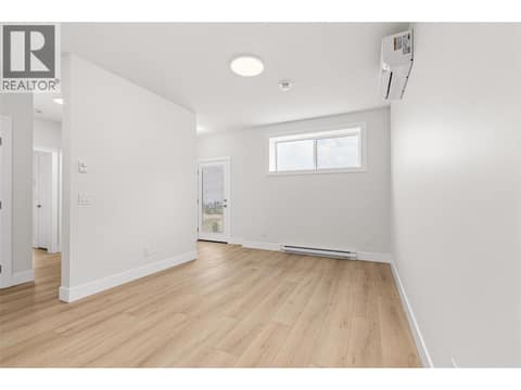 Suite Living Room | Lower Level at 1448 Whistling Pine Place, Wilden, Kelowna