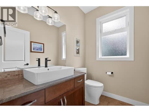 Convenient Main Level Powder Room at 2478 Stone Grove Crescent, Shannon Lake, West Kelowna