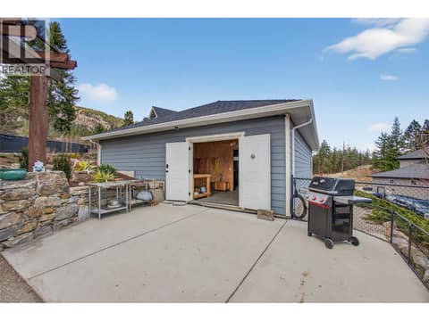 Easy Access From Garage to Backyard — Ideal for Equipment or Projects at 2478 Stone Grove Crescent, Shannon Lake, West Kelowna