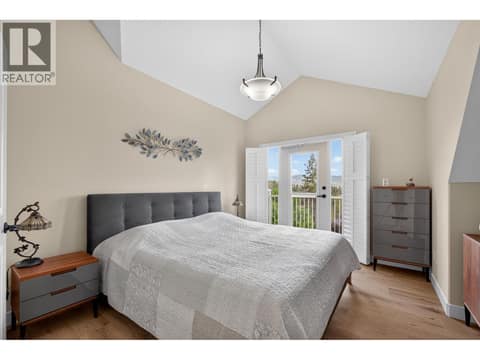 Primary Bedroom Retreat With Vaulted Ceilings And Abundant Natural Light at 2478 Stone Grove Crescent, Shannon Lake, West Kelowna