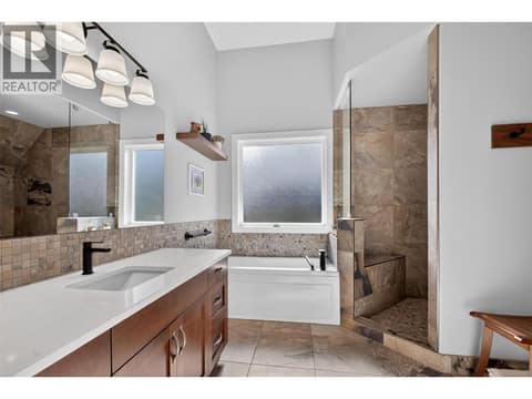 Spa-Inspired Bathroom With Soaker Tub And Walk-In Shower at 2478 Stone Grove Crescent, Shannon Lake, West Kelowna