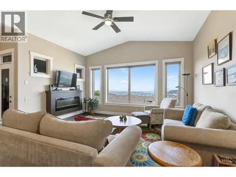 Big windows bring tons of natural light into Great Rom at 1836 Tower Ranch Boulevard Unit# 2, Rutland North, Kelowna