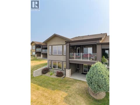 Green grass between your toes off your patio at 1836 Tower Ranch Boulevard Unit# 2, Rutland North, Kelowna
