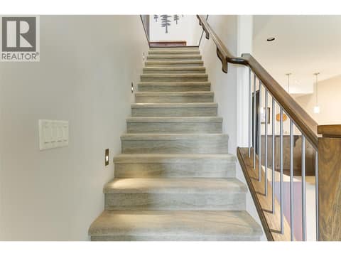 Theatre lit open stairs down at 1836 Tower Ranch Boulevard Unit# 2, Rutland North, Kelowna