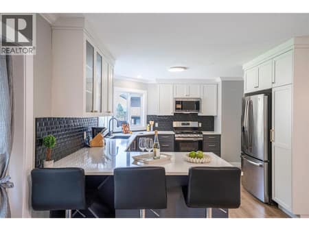 Main Level-  Open concept Kitchen at 670 Cassiar Road, Dilworth Mountain, Kelowna