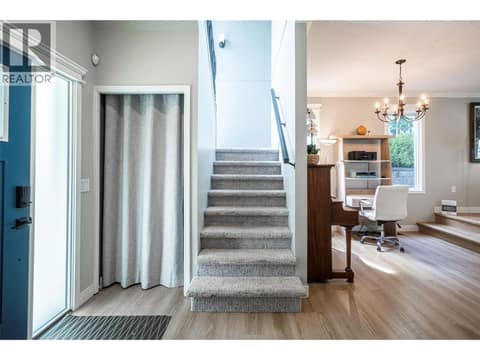 Main Level stairs up at 670 Cassiar Road, Dilworth Mountain, Kelowna