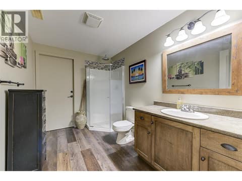 Main House Downstairs Bathroom (and cross over to suite / Utility Room) at 12633 Driftwood Court, Lake Country North West