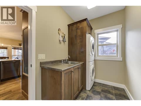 Main Laundry/Mud room at 12633 Driftwood Court, Lake Country North West