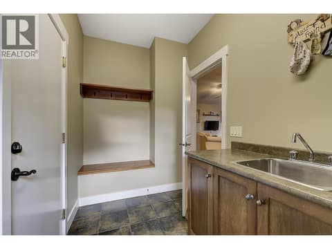 Main Laundry/Mud room at 12633 Driftwood Court, Lake Country North West