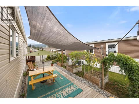 A beautifully utilized yard with raised garden beds, established plantings and plenty of room to enjoy the outdoors. at 9020 Jim Bailey Road Unit# 174, Lake Country East / Oyama, Kelowna