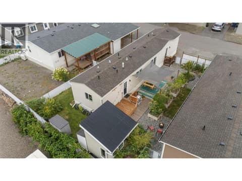 A bird’s-eye view highlights the generous yard and exceptional use of every inch of outdoor space. at 9020 Jim Bailey Road Unit# 174, Lake Country East / Oyama, Kelowna