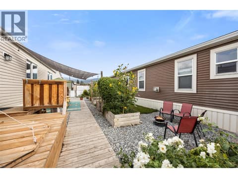 A private garden retreat with established plantings, raised beds and plenty of room to enjoy the outdoors. at 9020 Jim Bailey Road Unit# 174, Lake Country East / Oyama, Kelowna