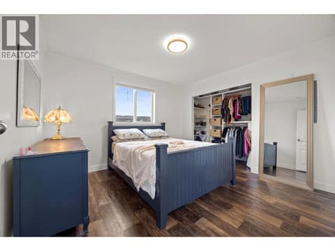 Bright and spacious primary bedroom with excellent closet storage. at 9020 Jim Bailey Road Unit# 174, Lake Country East / Oyama, Kelowna