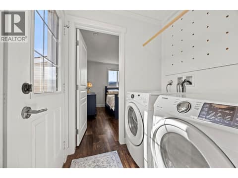 Convenient in-home laundry with direct access to the yard. at 9020 Jim Bailey Road Unit# 174, Lake Country East / Oyama, Kelowna