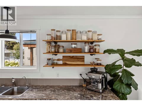 Open shelving adds character and convenient everyday storage. at 9020 Jim Bailey Road Unit# 174, Lake Country East / Oyama, Kelowna