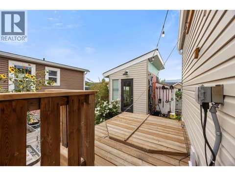 Spacious deck with a clever lift-up cover that keeps the Softub neatly tucked away when not in use. at 9020 Jim Bailey Road Unit# 174, Lake Country East / Oyama, Kelowna