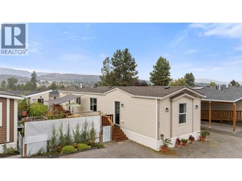 Welcoming exterior with plenty of parking and a nicely landscaped entrance. at 9020 Jim Bailey Road Unit# 174, Lake Country East / Oyama, Kelowna