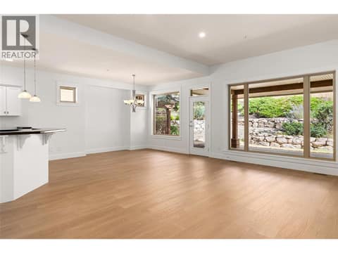 Dining Room off Kitchen and Living Room at 153 Mashie Crescent, Predator Ridge, Vernon
