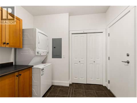 Laundry and Mudroom conveniently located between kitchen and garage. at 153 Mashie Crescent, Predator Ridge, Vernon