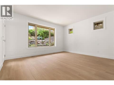 Primary Bedroom at 153 Mashie Crescent, Predator Ridge, Vernon