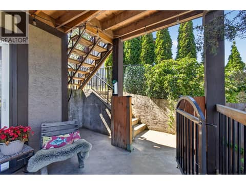Stair access to upstairs deck- full gated for children and dogs! at 1863 Horizon Drive, West Kelowna Estates