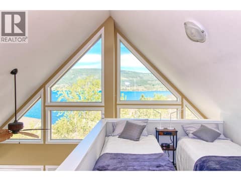 Open loft bedroom at 6871 Santiago Loop Unit# 115, Fintry, Kelowna