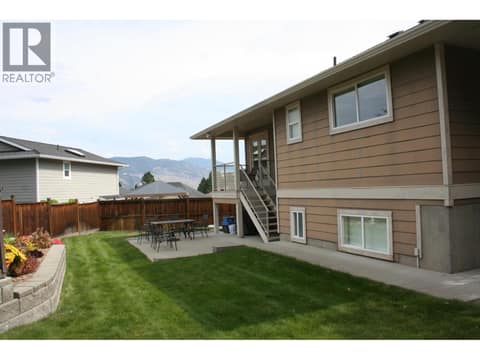 Back Yard has concrete Patio at 1985 Stikine Place, Juniper Ridge, Kamloops