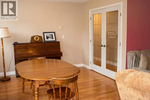 Family room with french doors opens onto Patio at 1985 Stikine Place, Juniper Ridge, Kamloops