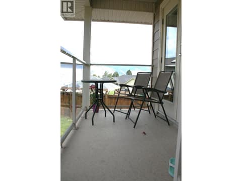 Upper covered patio off Kitchen at 1985 Stikine Place, Juniper Ridge, Kamloops