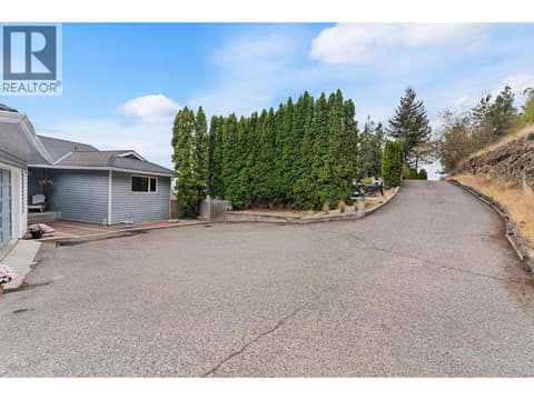 Double garage with extra parking for RV at 1108 Menu Road, Lakeview Heights, West Kelowna