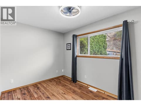 Second bedroom (main suite) at 1108 Menu Road, Lakeview Heights, West Kelowna