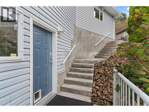 Stairs that starts from main house to bottom studio suite at 1108 Menu Road, Lakeview Heights, West Kelowna
