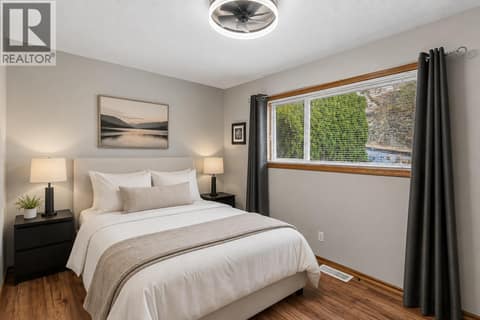 Virtually staged-second bedroom (main suite) at 1108 Menu Road, Lakeview Heights, West Kelowna