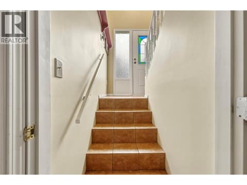 Main home - acces from entryway to suite at 3304 Sidney Crescent, Armstrong/ Spall., Spallumcheen