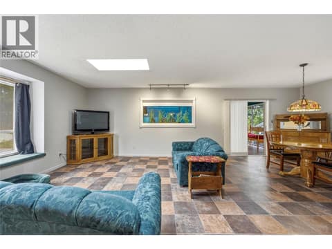Main home - living room, with buit in aquarium. Easily removable if you wish! at 3304 Sidney Crescent, Armstrong/ Spall., Spallumcheen