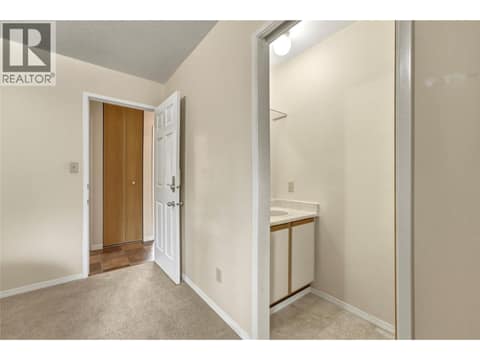 Main home - Primary bedroom & 2 piece ensuite at 3304 Sidney Crescent, Armstrong/ Spall., Spallumcheen