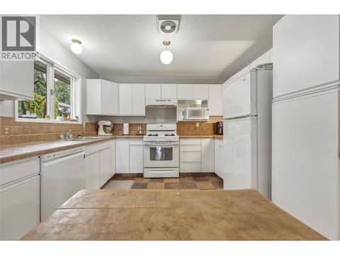 Main home - upstairs kitchen at 3304 Sidney Crescent, Armstrong/ Spall., Spallumcheen