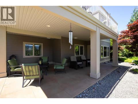 Covered lower patio offering a private, shaded outdoor living space. at 471 Long Ridge Drive, Wilden, Kelowna