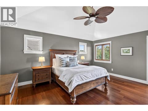 Spacious primary retreat with vaulted ceilings and a private deck with panoramic views. at 471 Long Ridge Drive, Wilden, Kelowna