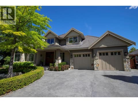 Stunning curb appeal with stamped concrete driveway, beautiful stonework and a durable concrete tile roof. at 471 Long Ridge Drive, Wilden, Kelowna