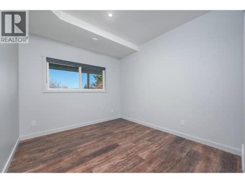 Downstairs Bed 1 at 7936 McLennan Road, North BX, Vernon